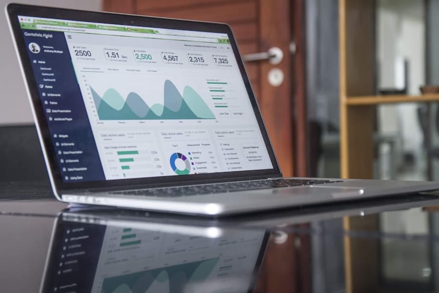 Performance metrics on a laptop during a team review